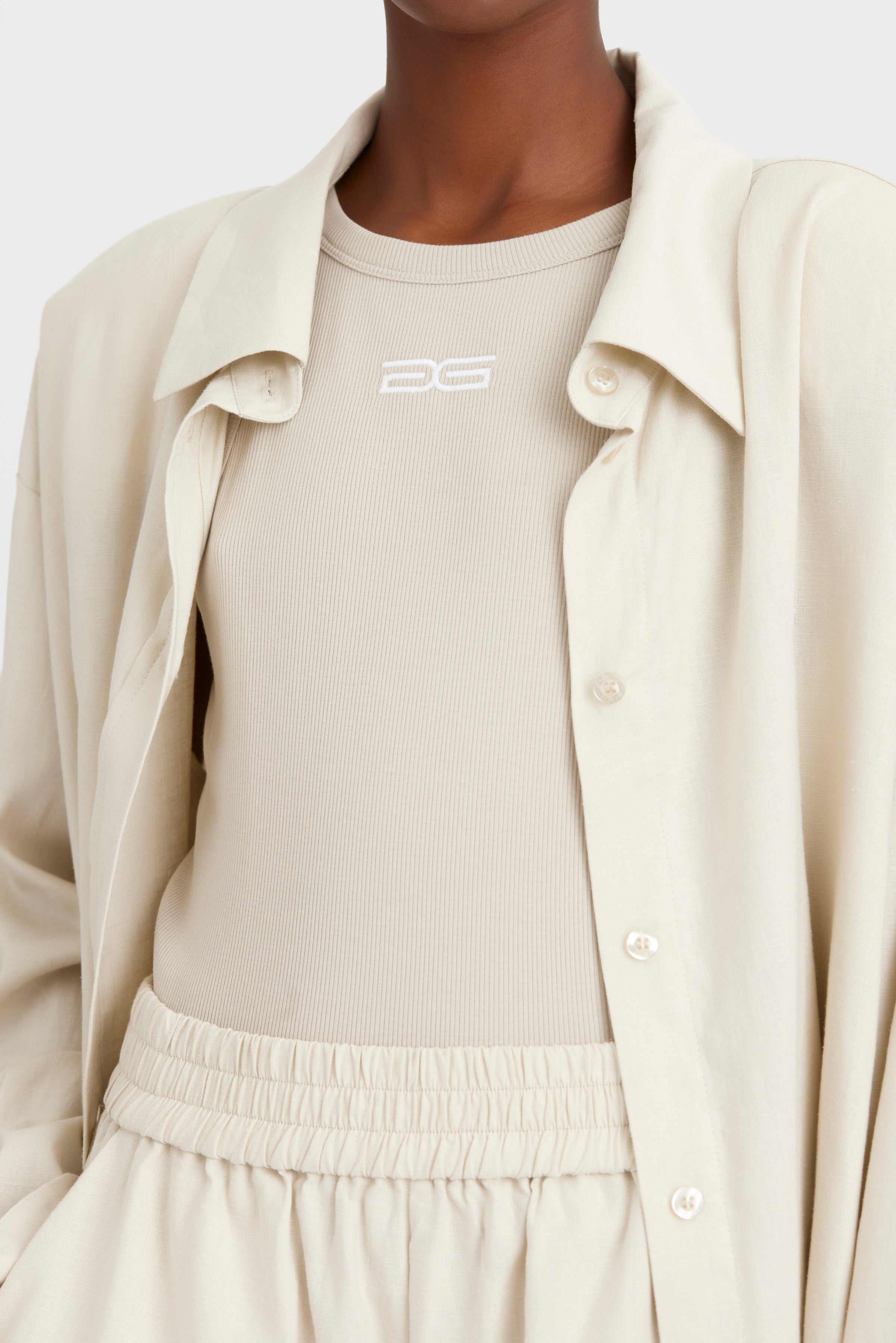 Gestuz Drew Logo Top Island Fossil